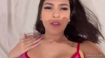 Naiad river nymph in a large-tailed provocative pajama holding a stick