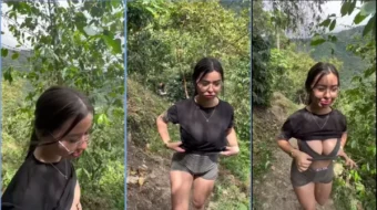Paola Suárez retirando la camisa en el medio del sendero